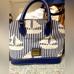 Blue and white striped Dooney and Bourke with sail boats